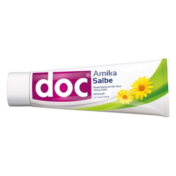 Tube mit doc Arnika Salbe, weiß mit lila Schrift und gelben Blumen, Anwendung auf der Haut.