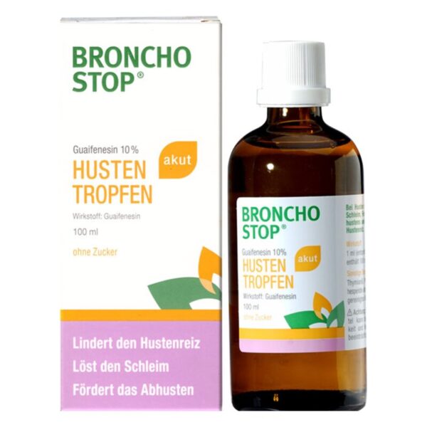 Braune Glasflasche mit Husten Tropfen und einer weißen Kappe neben der Verpackung in lila, grün und orange.