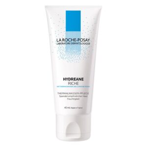 Sonnenschutzcreme in einer weißen Tube mit blauer Schrift und blauem Dekor, für empfindliche Haut geeignet.