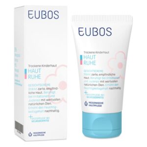 Gesichtscreme in einer Tube für trockene Kinderhaut, verpackt in einer weißen Box mit blauen und rosa Akzenten.