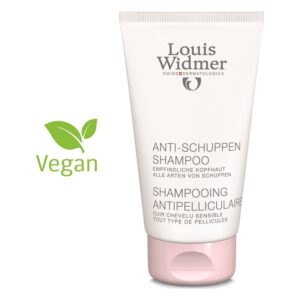 Weißes Shampoo-Tube mit hellrosa Verschluss, beschriftet mit Anti-Schuppen und veganem Symbol neben einer Blatt-Illustration.