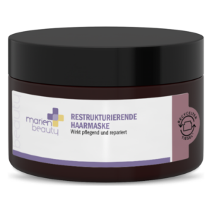 Brauner Kunststofftiegel mit schwarzem Deckel, beschriftet mit "Restrukturierende Haarmaske, wirkt pflegend und repariert".