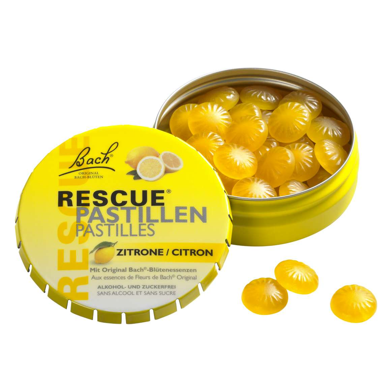 Gelbe Dose mit RESCUE Pastillen, die im Inneren sichtbar sind, mit Zitrone als Geschmacksrichtung.