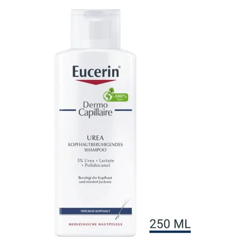 Weißer Shampoo-Flasche mit rot-blauer Beschriftung, enthält 5% Urea und ist für trockene Kopfhaut.