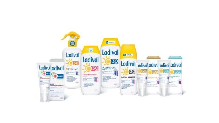 Verschiedene Ladival Sonnenpflegeprodukte in unterschiedlichen Flaschen und Tuben, meisten mit gelben Kappen und weißen Etiketten.