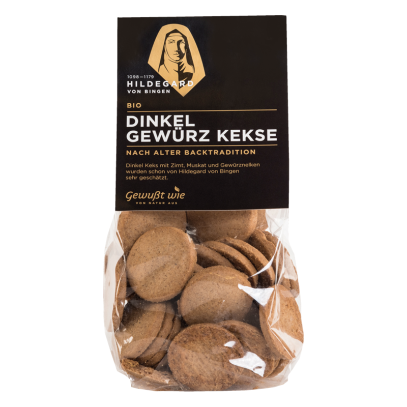 Biosiegelverpackung mit Dinkel Gewürz Keksen, präsentiert in einer transparenten Tüte, betont traditionelle Zubereitung.
