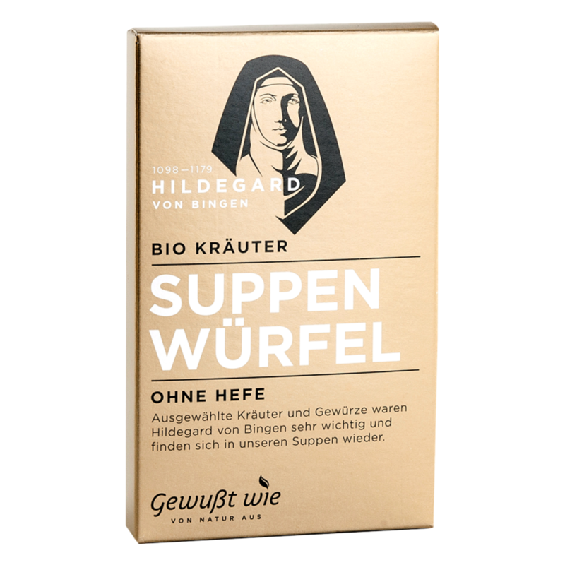 Verpackung von Bio Kräuter Suppenwürfel, goldfarben mit Illustration von Hildegard von Bingen und Textinformationen.
