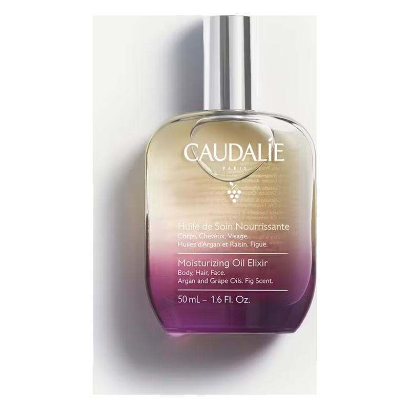 Flasche mit pflegendem Öl Elixier von Caudalie, in sanften lila und gold Farben, für Körper, Haare und Gesicht.
